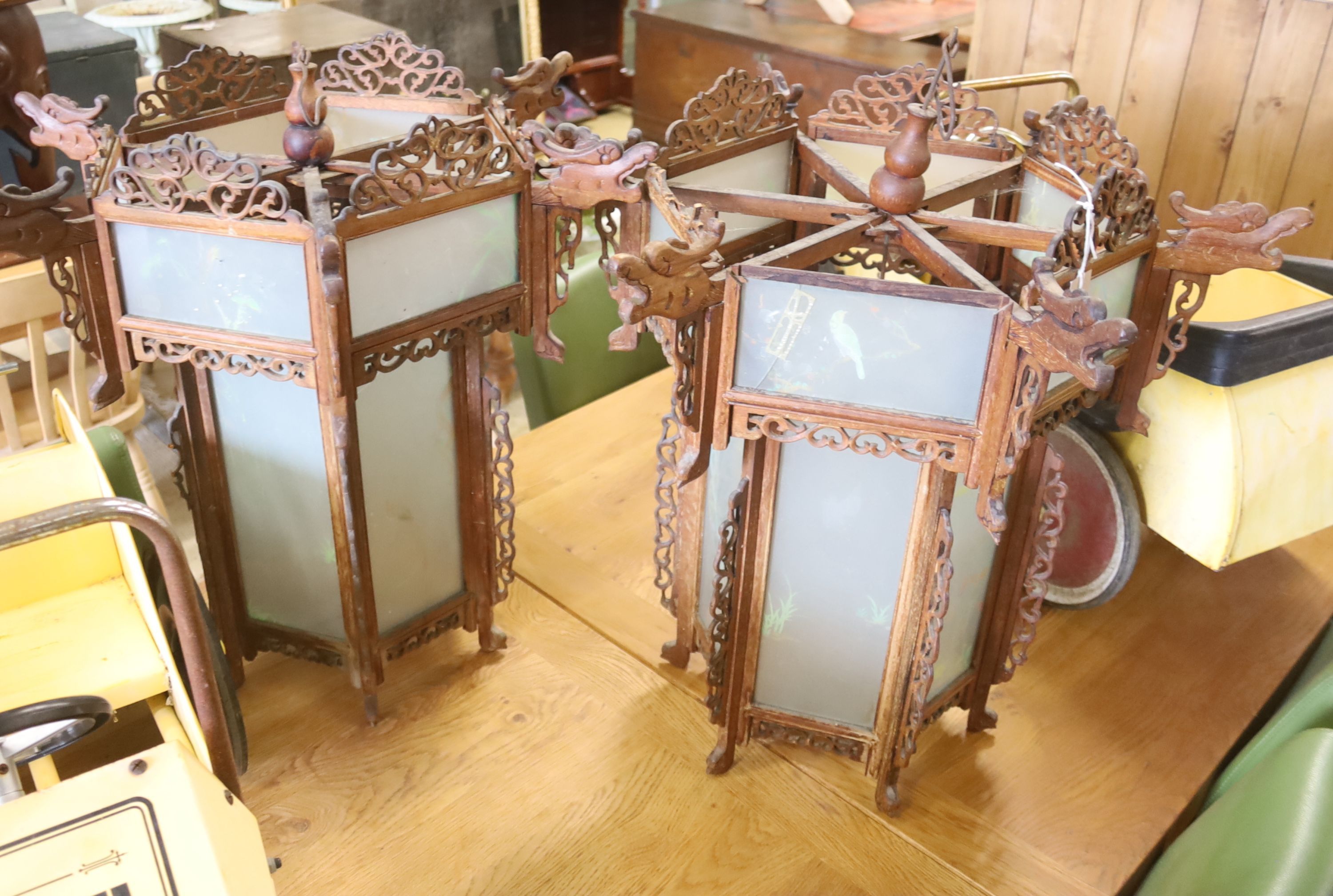 A pair of early 20th century Chinese style glazed hexagonal lanterns, width 69cm, height 60cm